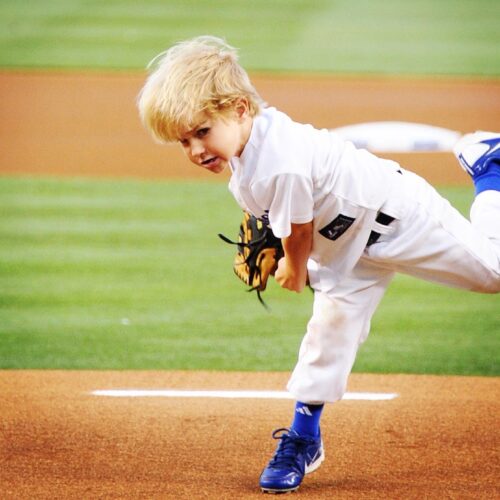 baseball player in blue cleats - 1