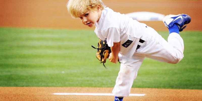 baseball player in blue cleats - 1