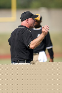 Coach yelling on field during game